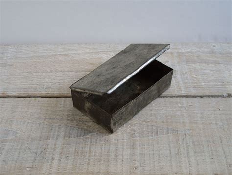 black metal box with lid|metal box with hinged lid.